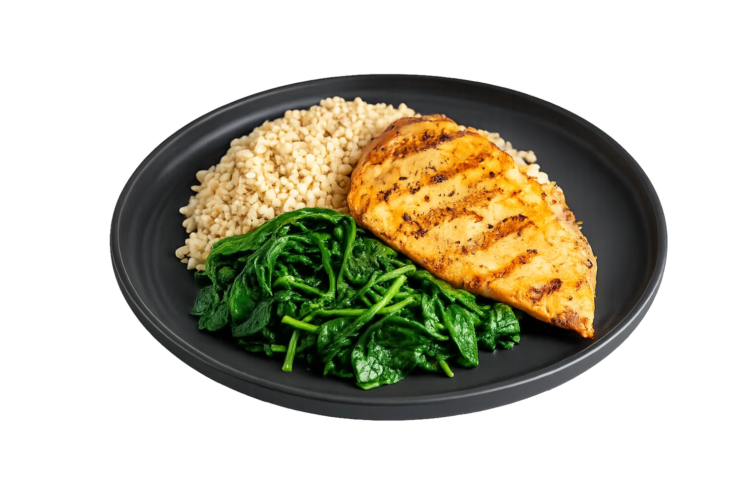 Grilled chicken with bulgur and sautéed spinach, plated on a dark ceramic dish.